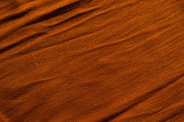 Arkaplan için kahverengi kadife kumaşın yüzeyi.