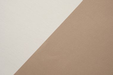 Arkaplan için kahverengi kağıt ve krem rengi kağıtlarının yüzeyi.