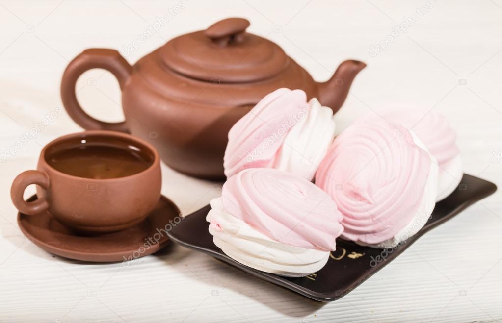 Ceramic teacup and pink zephyr