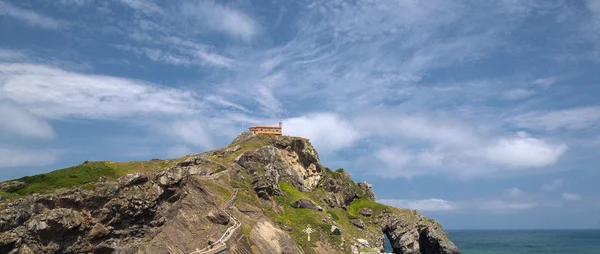 Chapel at rock top on an ocean coast — Stock Photo, Image