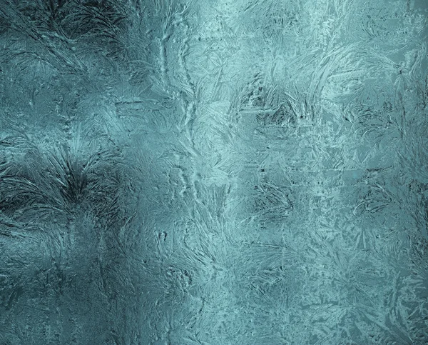 Pequeños patrones helados en vidrio en tono gris-azul —  Fotos de Stock