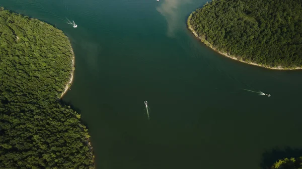 Top view of the river and its spills. The river is located near the forest