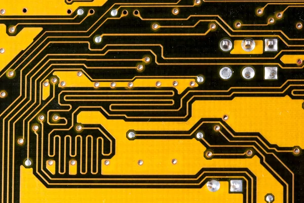 Zwarte en gele pcb circuit van moederbord. — Stockfoto