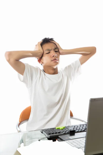 Asian teenager get confuse with computer — Stock Photo, Image