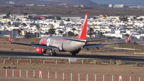 Boeing 737-800 NG of Jet2 airline landing rollout and taxiing on airport runway — Stock Video