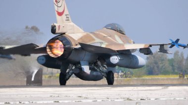 Israel Armed Forces military fighter jet takes off with full afterburner clipart