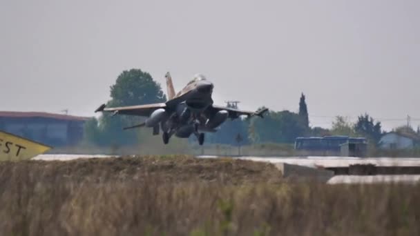 Frontal view of a modern supersonic air superiority jet plane landing — Video Stock