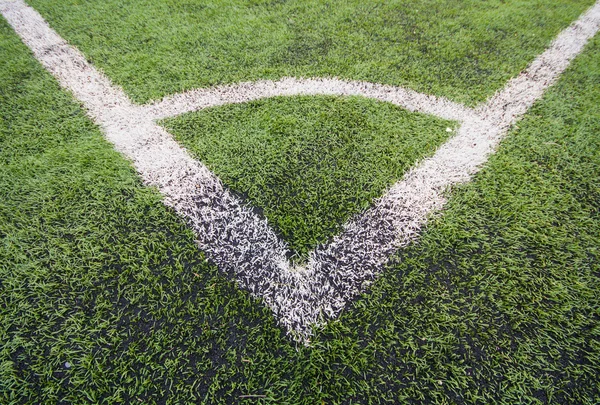 Campo de futebol relvado artificial, uma linha de marcador de canto — Fotografia de Stock