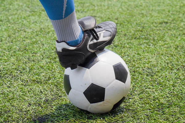 Soccer ball with his feet — Stock Photo, Image