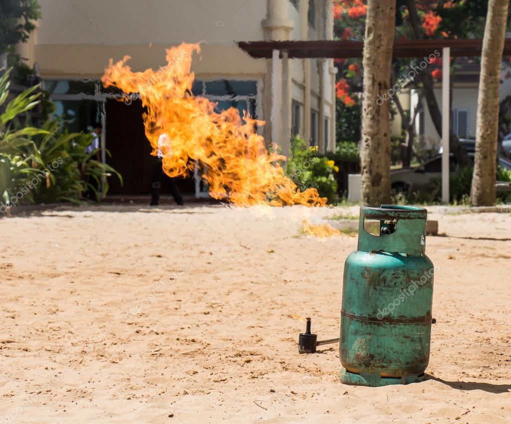 Training basic of fire fighting test fires leak gas tank Stock Photo by