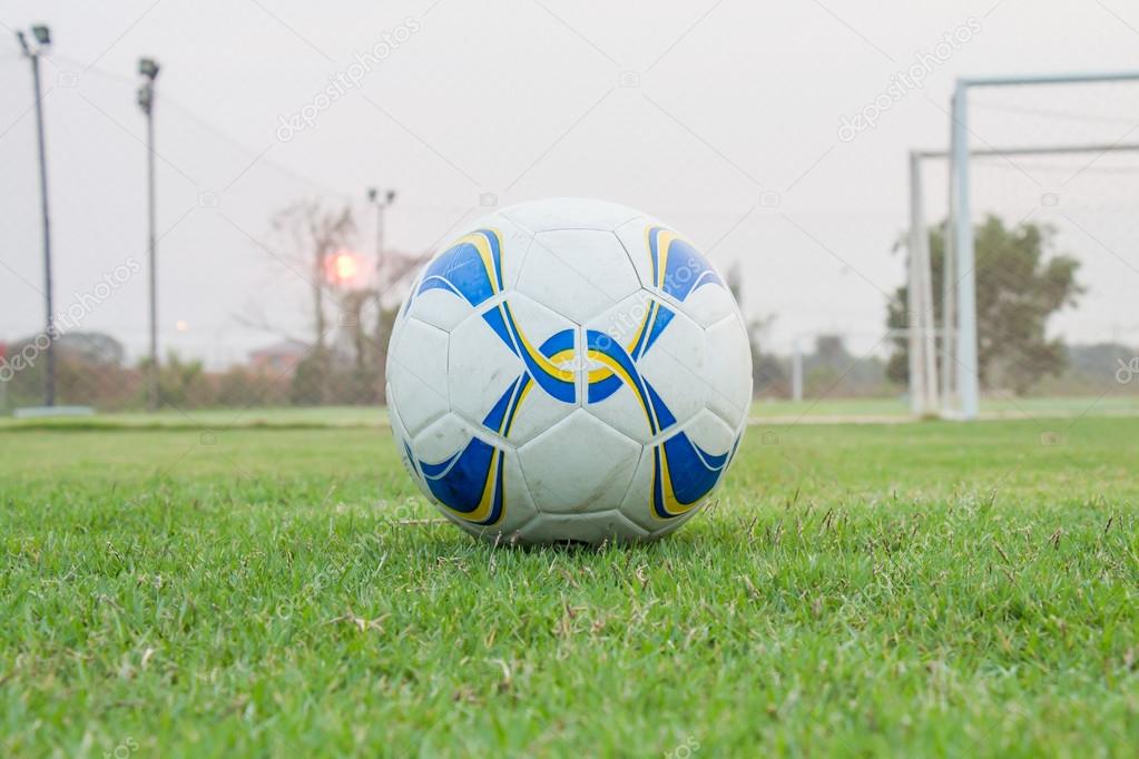 Soccer ball on the green grass
