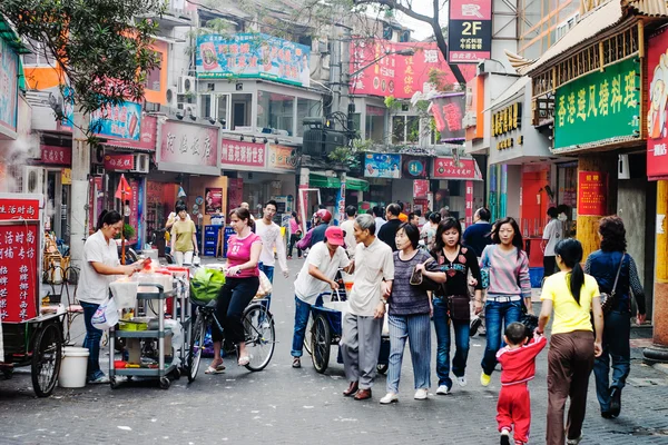 Street of Shanghai, China, with shops and people — Stock Photo, Image