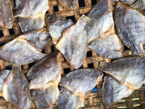Dry Salty Nile Tilapia Fish Bamboo Floor — Stock Photo, Image