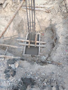 the concrete foundation foundation at building construction site