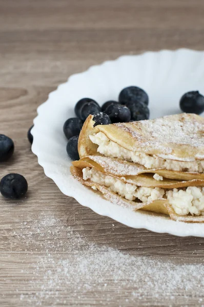 Pancake with cheese and blueberries — Stock Photo, Image