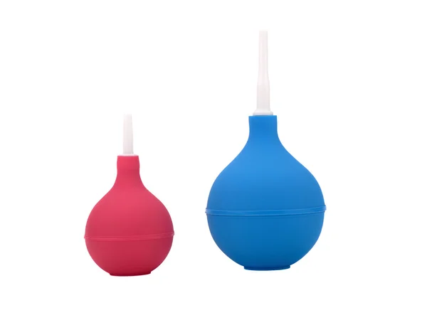 Two enemas red and blue on a white background — Stock Photo, Image