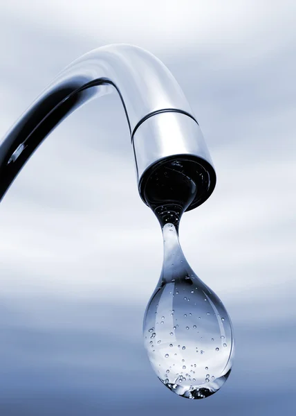 Water drop coming out of tap — Stock Photo, Image