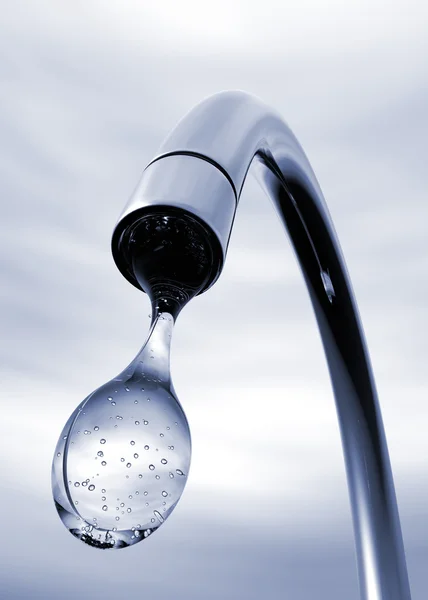 Water drop coming out of tap — Stock Photo, Image