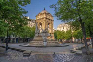 Paris, France - 12 30 2020: Halles district. Fountain of the Innocents in Joachim-du-Bellay square clipart