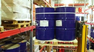 Forklift truck  moves barrels