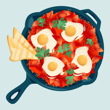 Shakshuka, domates sosunda haşlanmış yumurtadan yapılmış, dökme demir tavada servis edilen ekmek.. 