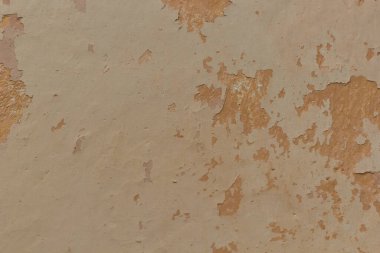 Eski alçının turuncu dokusu. rafa kaldırılmış duvar dokusu alçı sarı gölgeler arka plan. 