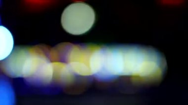 Bulanık odaklı çok renkli bokeh ışıkları arkaplanı.