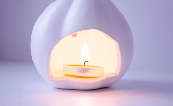 Burning candle pumpkin — Stock Photo, Image