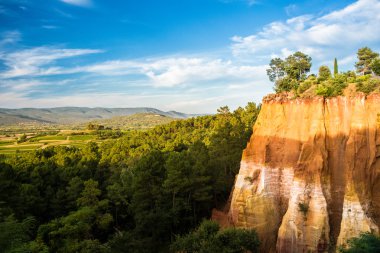 France. Landscape of the ocher quarries of Roussillon. clipart