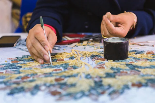 Artist, Mosaic Tools, Hand Craft, Uses Tweezers To Make Mosaic, Close Up. Ancient process of making mosaics. Madaba, Jordan.