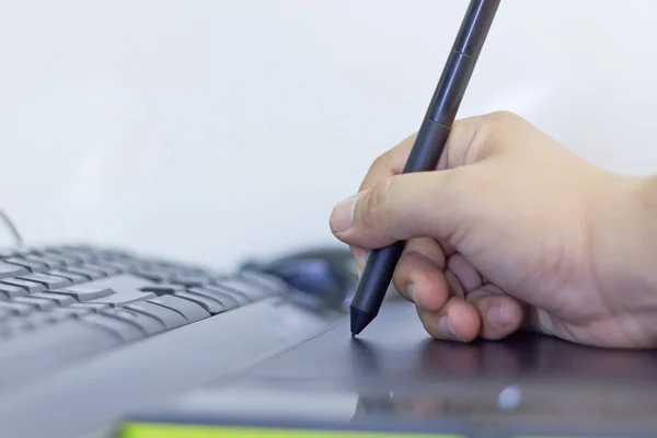 hand on touchpad