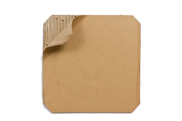 Cartón corrugado - hoja de papel marrón, aislado — Foto de Stock