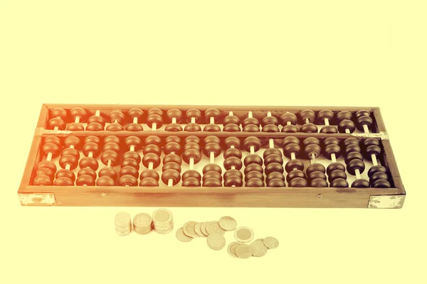 Vintage style - houten abacus kralen en Thaise baht munten — Stockfoto