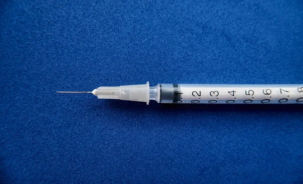 View Syringe Closeup Blue Background — Stock Photo, Image
