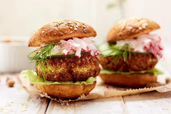 Falafel burger on a wooden rustic table — Stock Photo, Image
