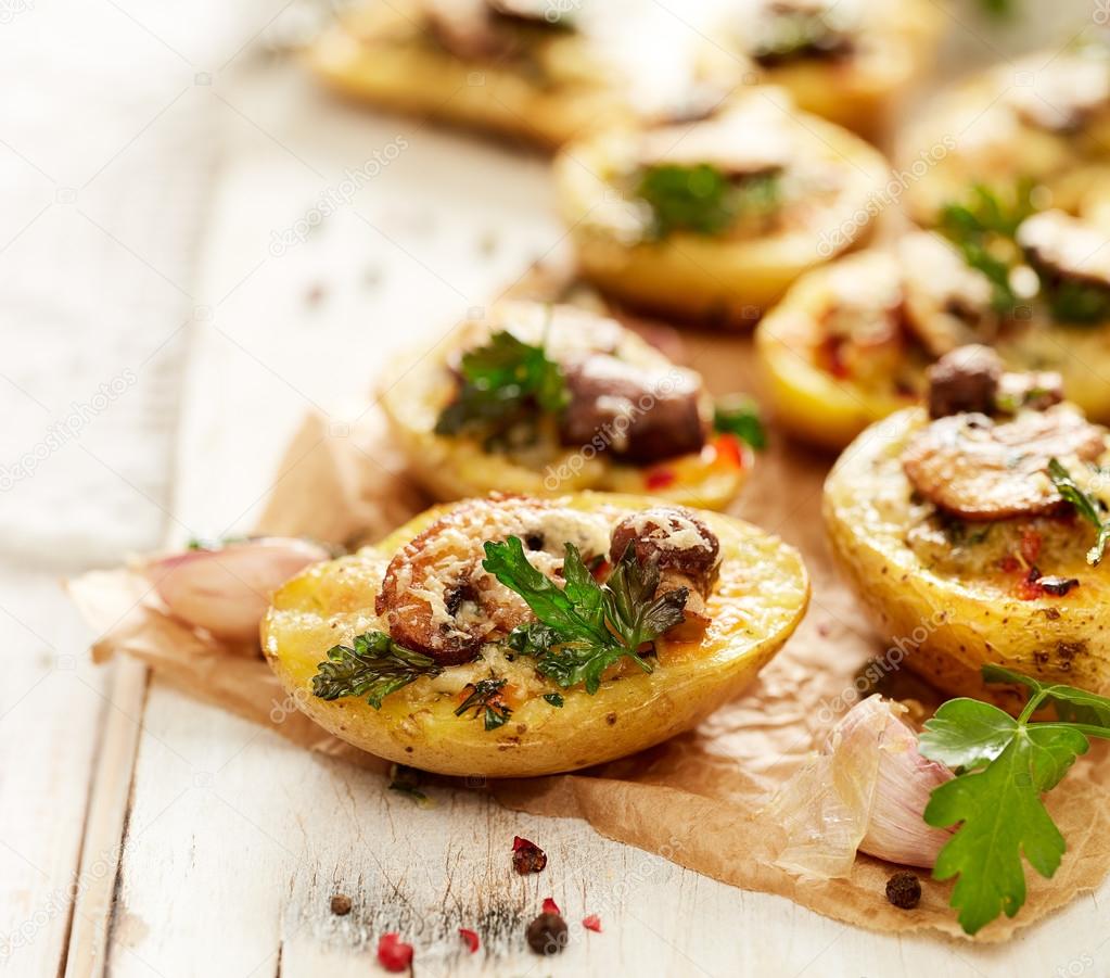 Baked potatoes stuffed with mushroom and cheese Stock Photo by ©zi3000