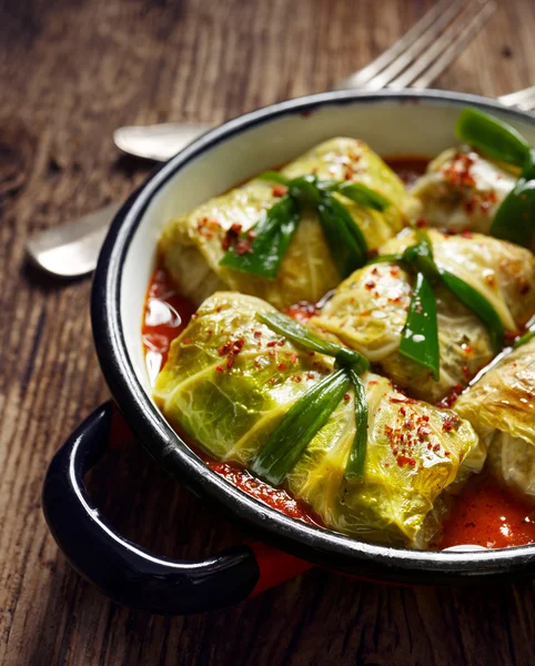 Cabbage rolls, stuffed cabbage stewed in tomato sauce — Stock Photo, Image