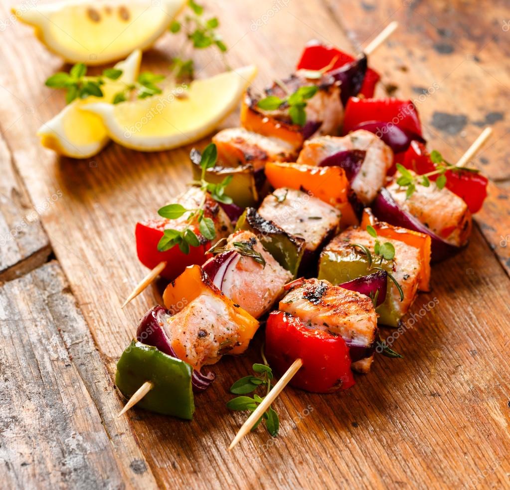 Grilled skewers of salmon and vegetables — Stock Photo © zi3000 80499012