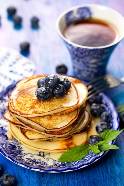 Pancakes with addition of fresh blueberries — Stock Photo, Image