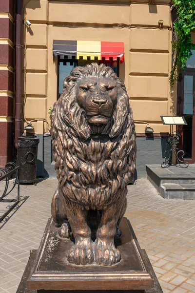 bronze sculpture of a formidable lion on the central street of Kazan, Russia. The concept of strength, power.