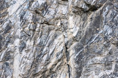 Çeşitli renk ve şekillerde soyut desenli doğal mermer yüzey