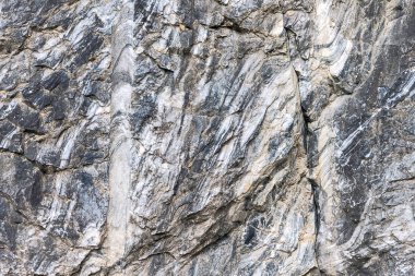 Çeşitli renk ve şekillerde soyut desenli doğal mermer yüzey