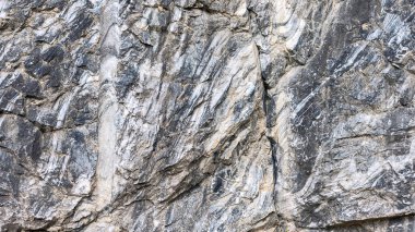 Çeşitli renk ve şekillerde soyut desenli doğal mermer yüzey