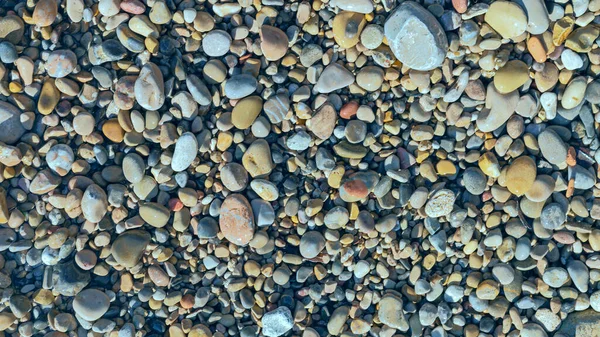 Seixos Mar Multicoloridos Molhados Praia Oceano — Fotografia de Stock