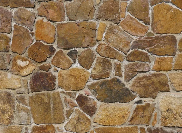 Kleurrijke stenen muur achtergrond of textuur — Stockfoto