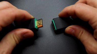 Connecting an HDMI Cable isolated on gray background