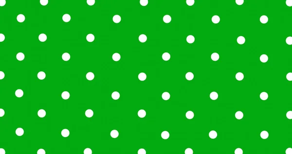 Big white polka dots on green, seamless background. Seamless pattern of large white polka dots on a green background for arts, crafts, fabrics, decorating, albums and scrap books