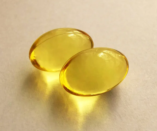 Two Fish Oil Capsules Omega White Background — Stock Photo, Image