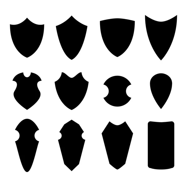 Ensemble de bouclier en style silhouette, vecteur — Image vectorielle