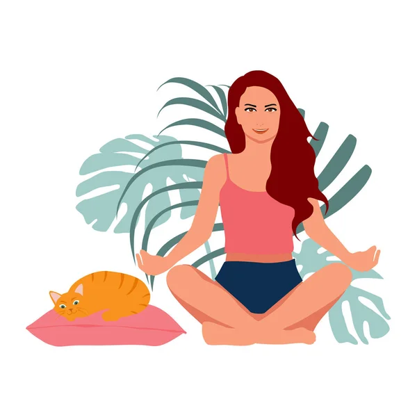 Woman meditating and cute ginger cat lying on pillow — Fotografia de Stock